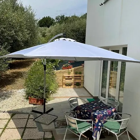 Апартаменты L'uliveto *